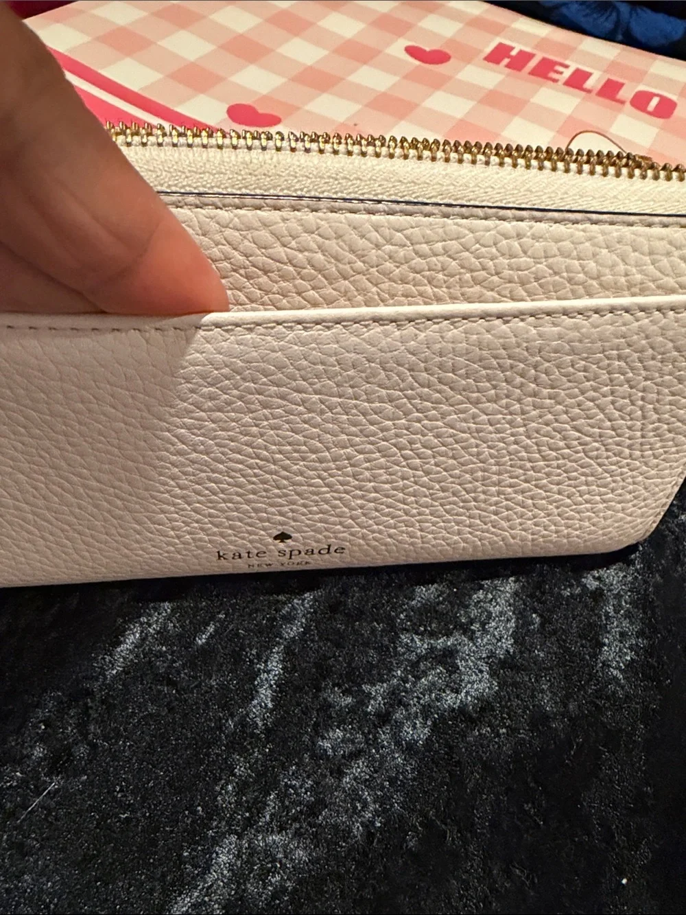 kate spade White Pebbled Leather Zip Wallet with Black Bow and Gold Bar